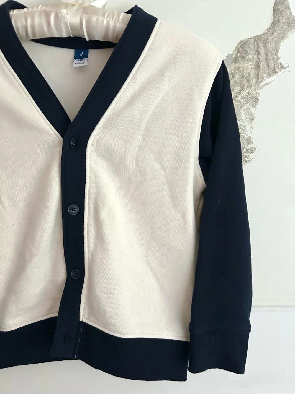 Kid’s Y2K-Inspired Two-Tone Navy and Cream Cardigan Sweater